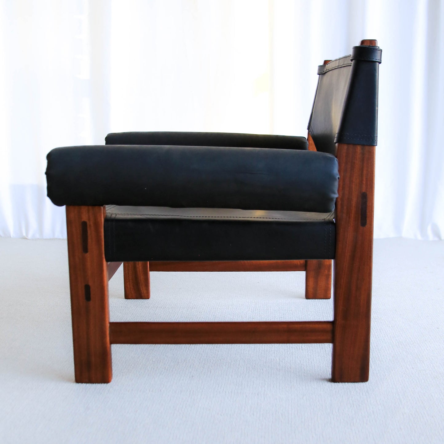 A Pair of Safari Model Leather and Mahogany Armchairs, by John Tabraham for Kallenbach's