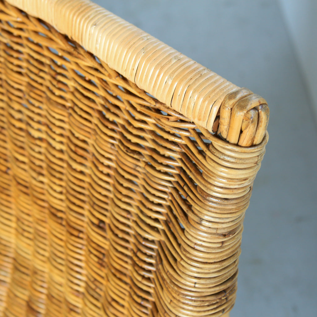 A Pair of Cane Armchairs