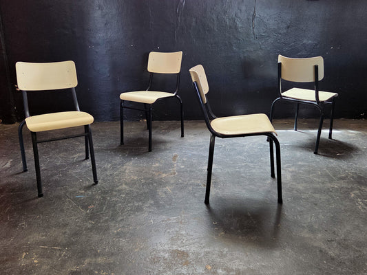 Four Cream and Black Chappie Chairs