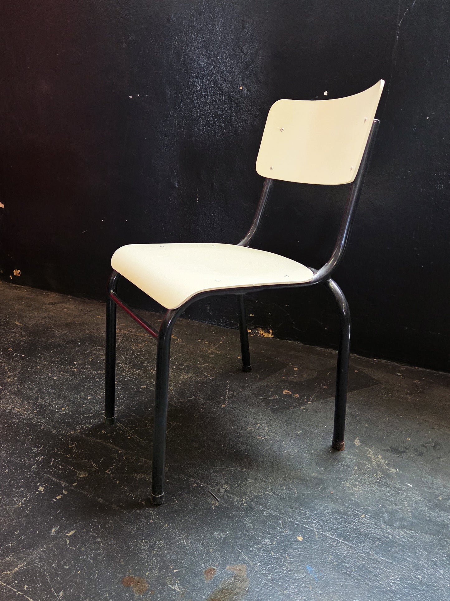 Four Cream and Black Chappie Chairs