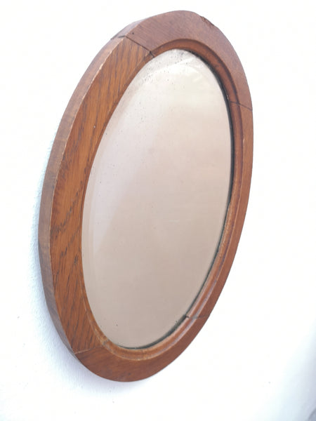 Vintage Beveled Mirror in an Oval Oak Frame