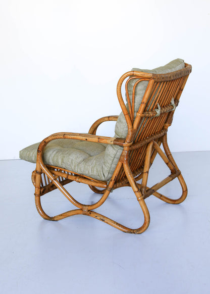 A Pair of Wingback Cane Armchairs