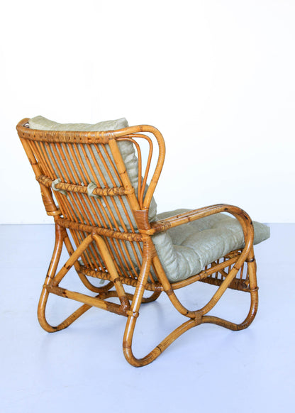 A Pair of Wingback Cane Armchairs