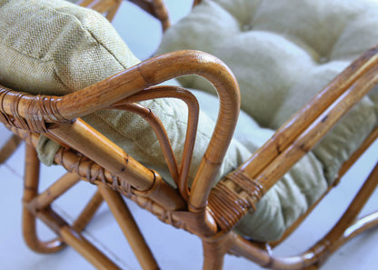 A Pair of Wingback Cane Armchairs