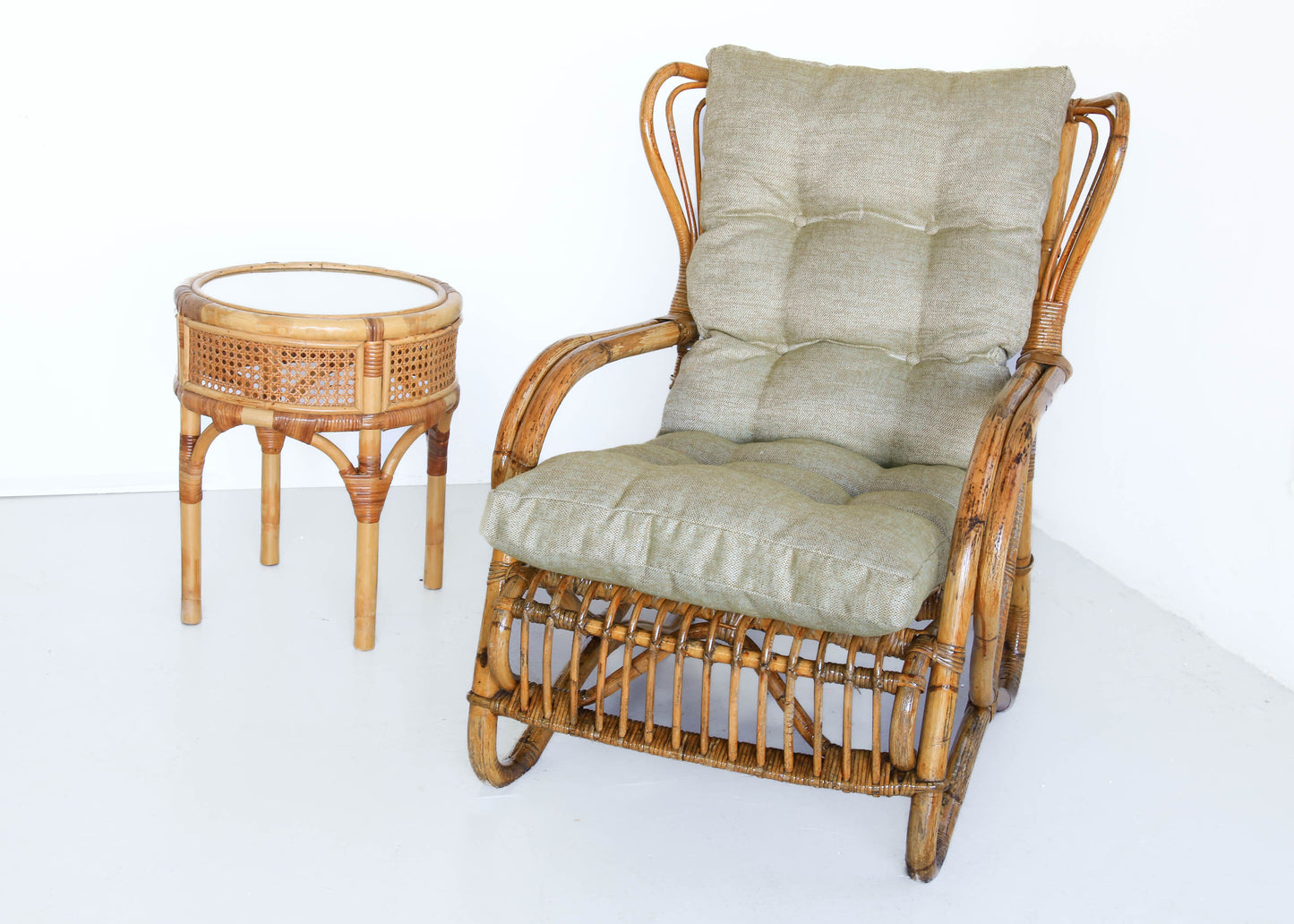 A Pair of Wingback Cane Armchairs