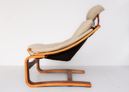 A Pair of Kroken Armchairs with Footrests - priced individually