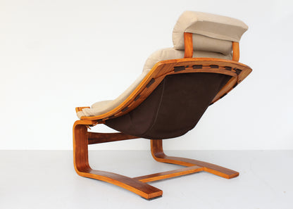 A Pair of Kroken Armchairs with Footrests - priced individually