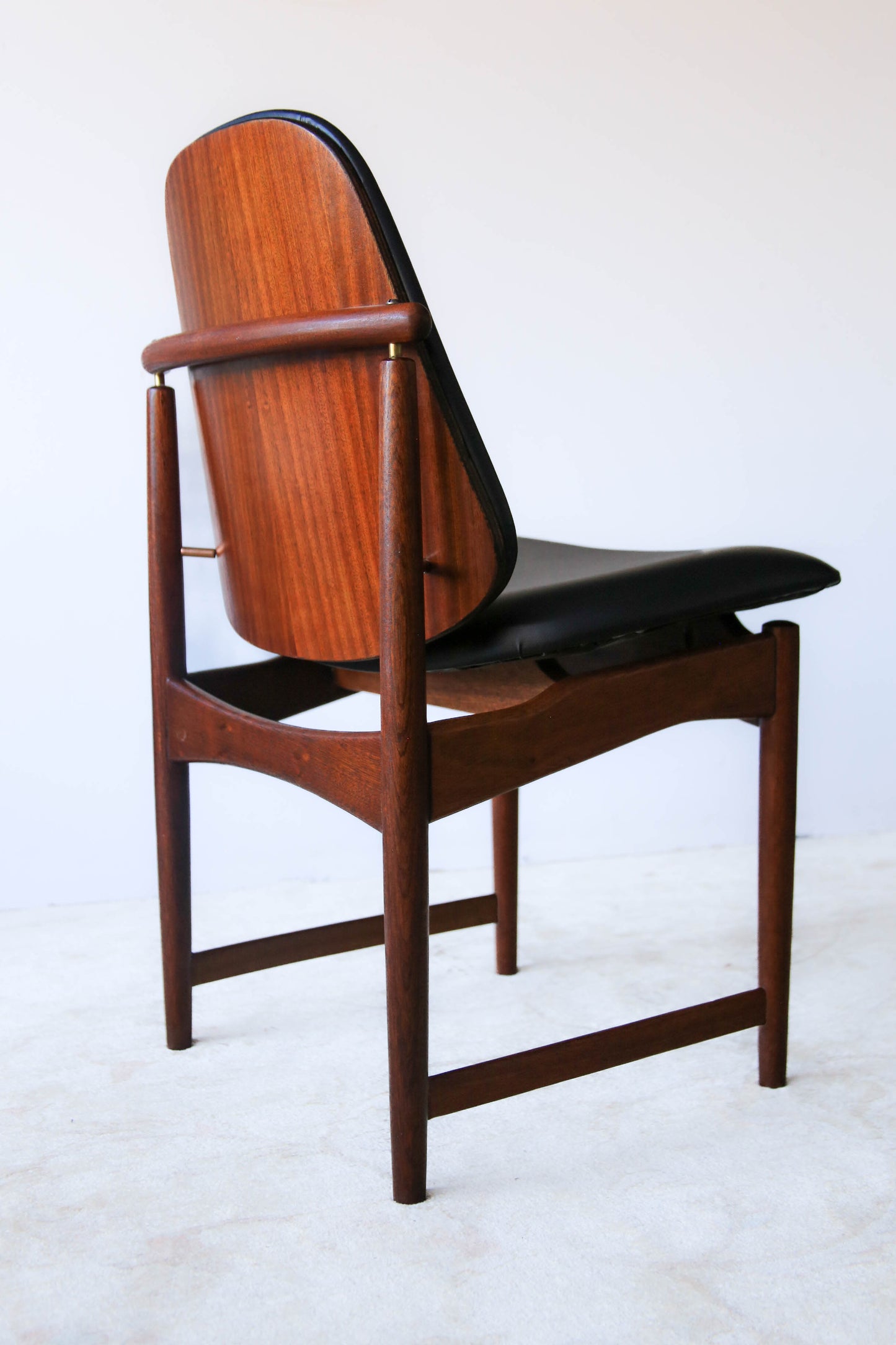 A Set of Four Frystark Status Dining Chairs