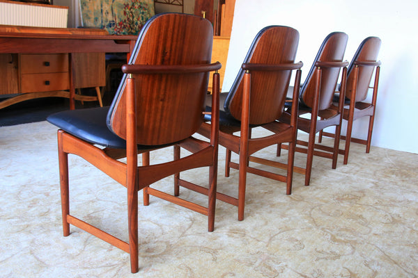 A Set of Four Frystark Status Dining Chairs