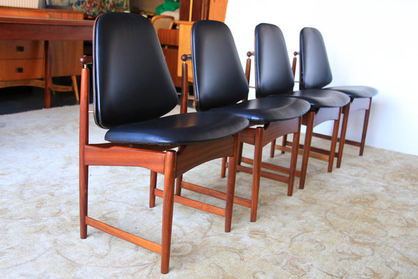 A Set of Four Frystark Status Dining Chairs