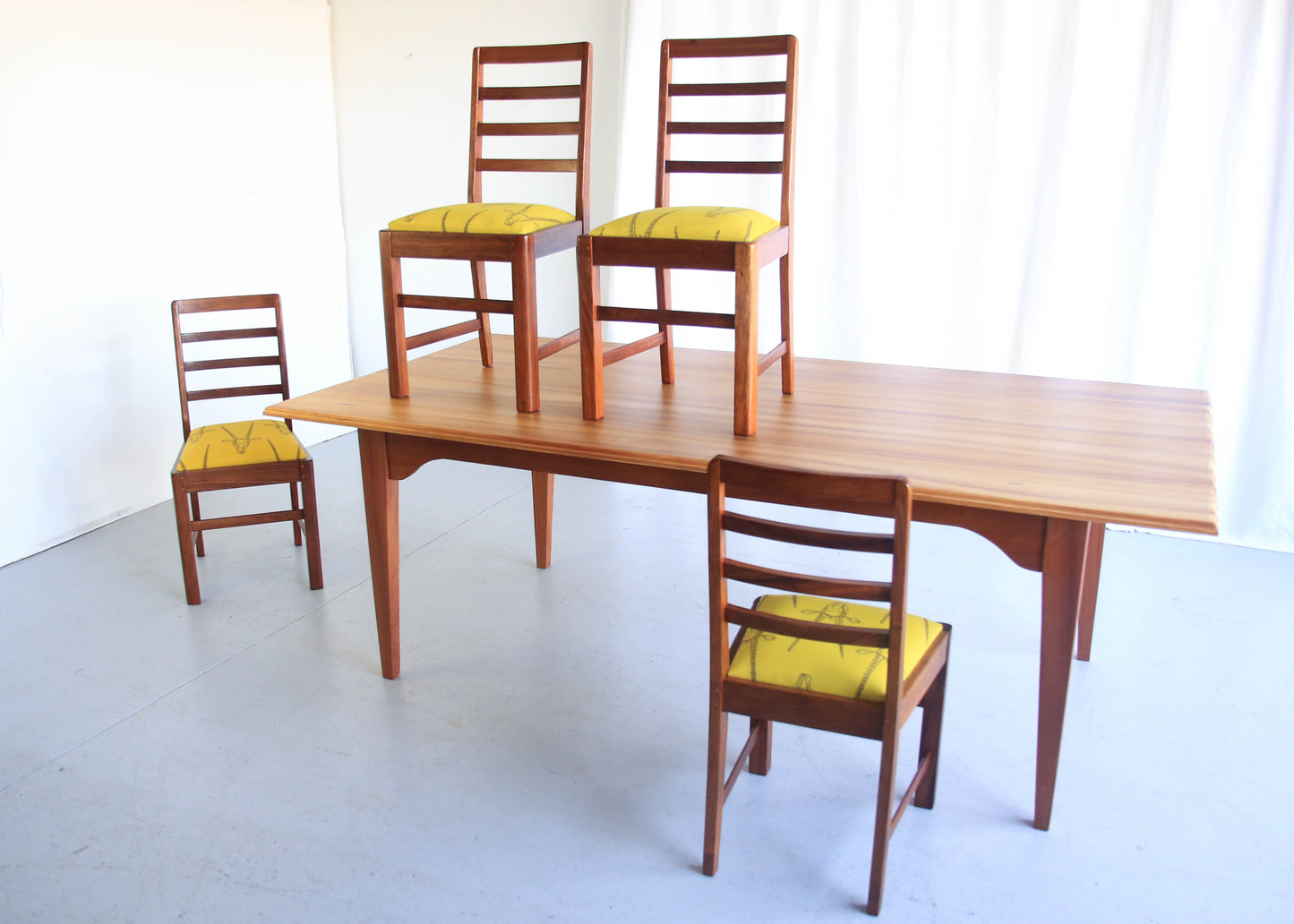 Four Ladder Back Dining Chairs