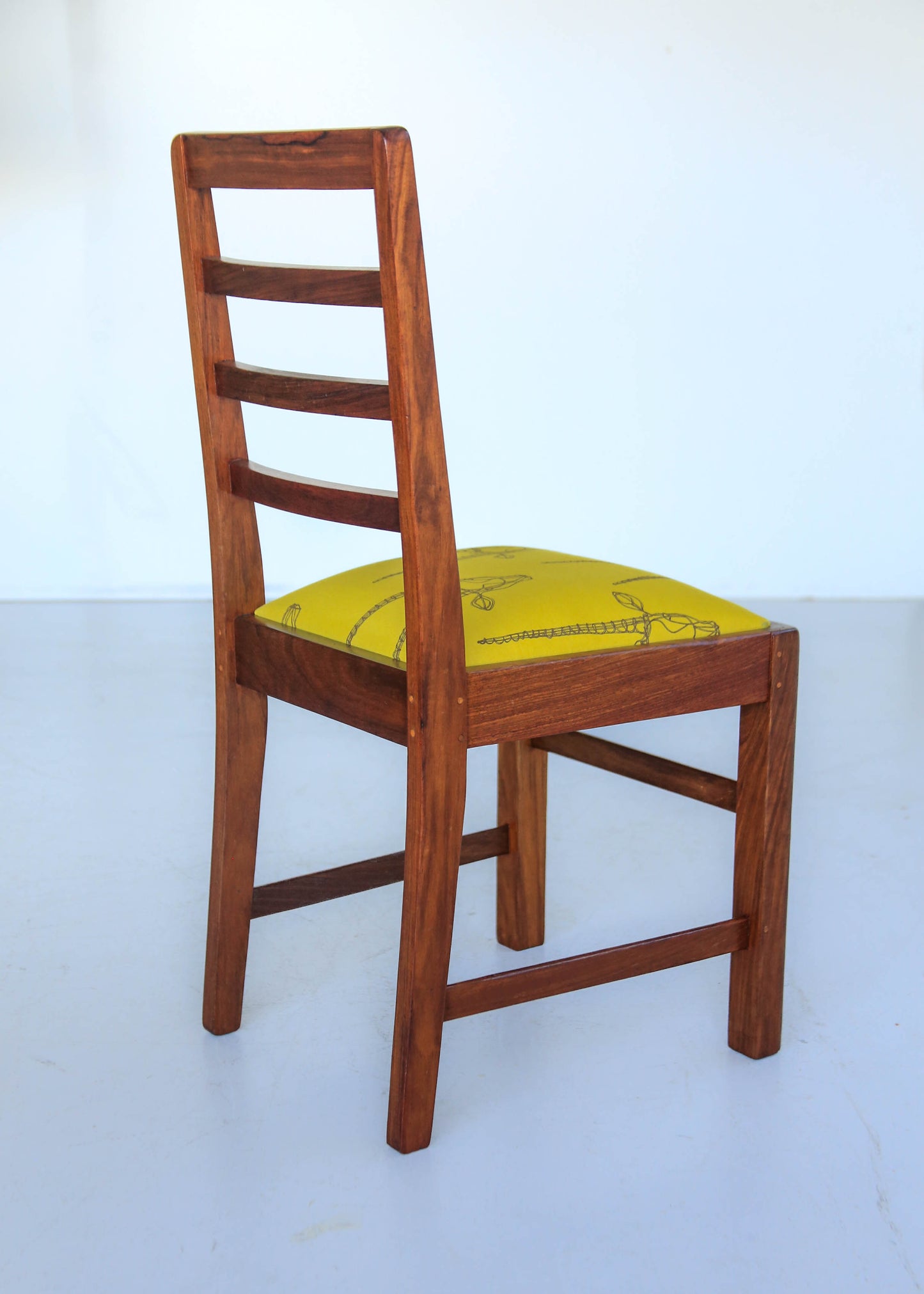 Four Ladder Back Dining Chairs