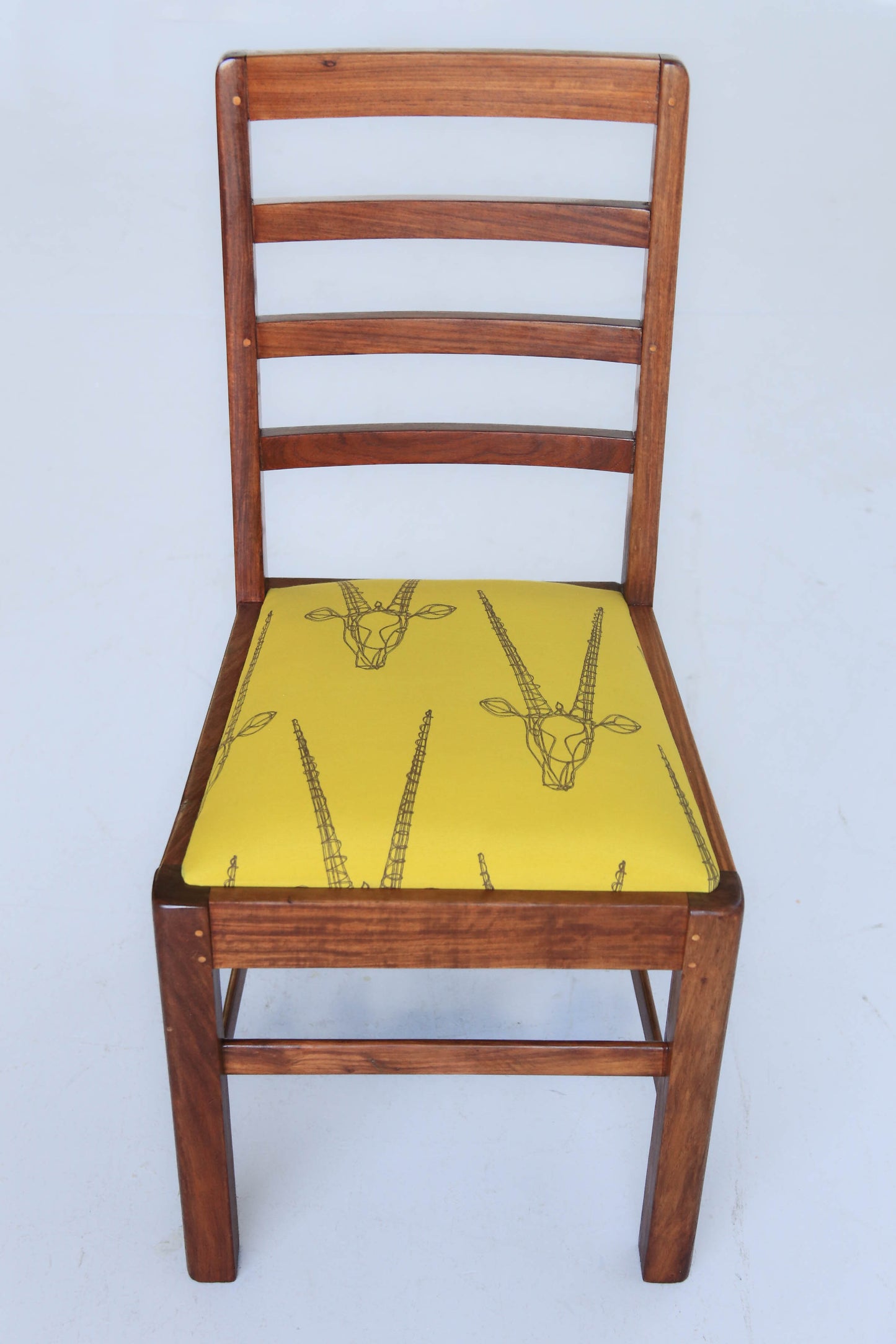 Four Ladder Back Dining Chairs