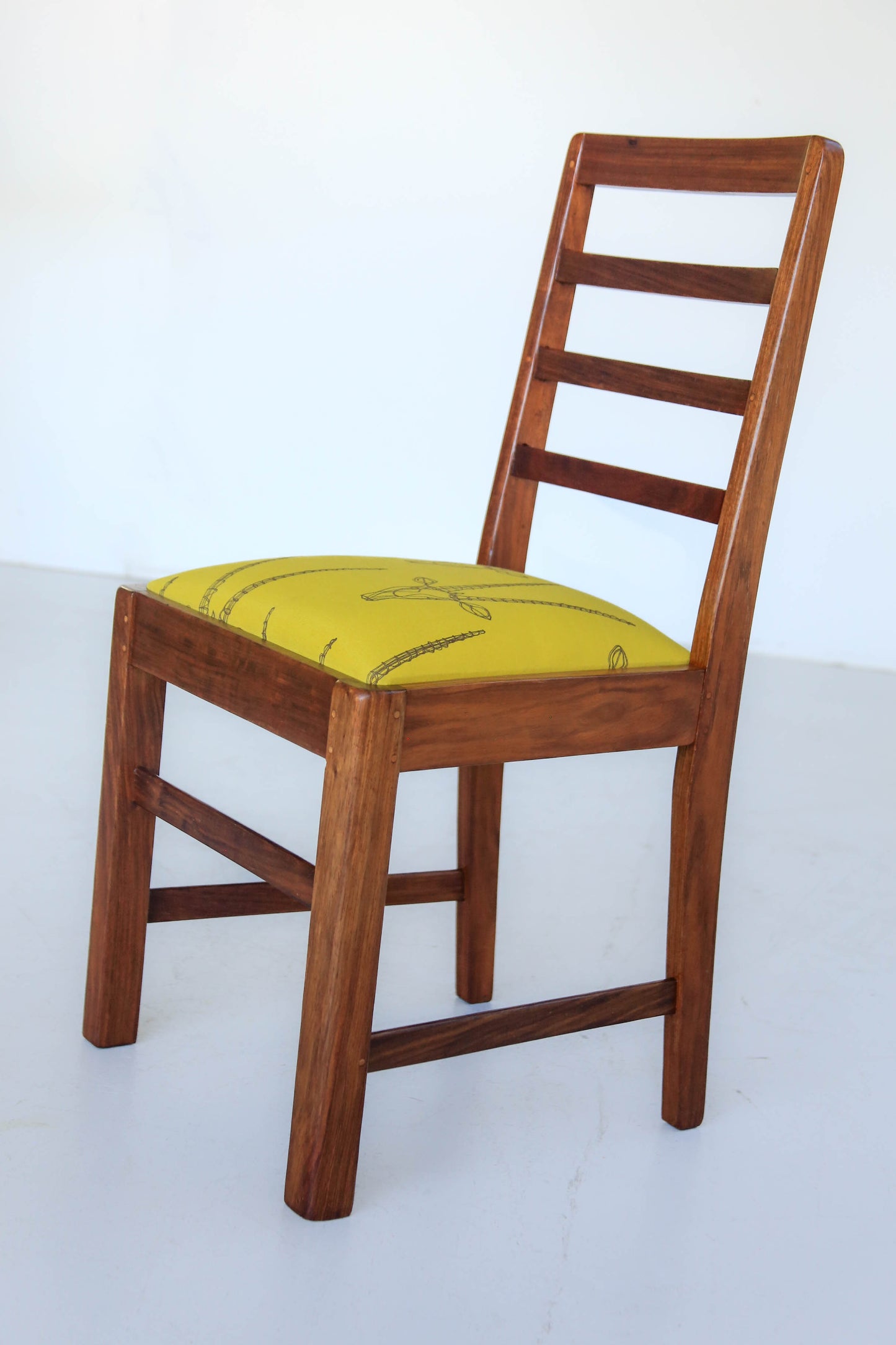 Four Ladder Back Dining Chairs