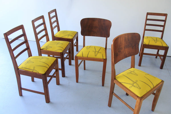 Four Ladder Back Dining Chairs