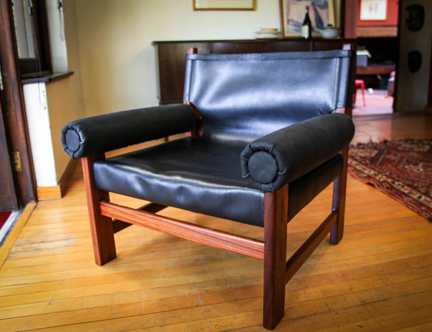 A Pair of Safari Model Leather and Mahogany Armchairs, by John Tabraham for Kallenbach's