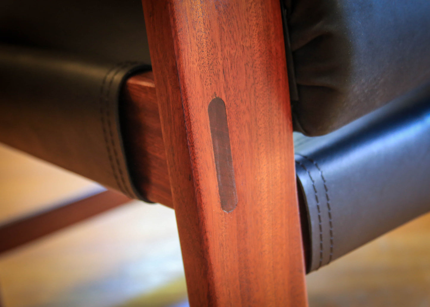 A Pair of Safari Model Leather and Mahogany Armchairs, by John Tabraham for Kallenbach's