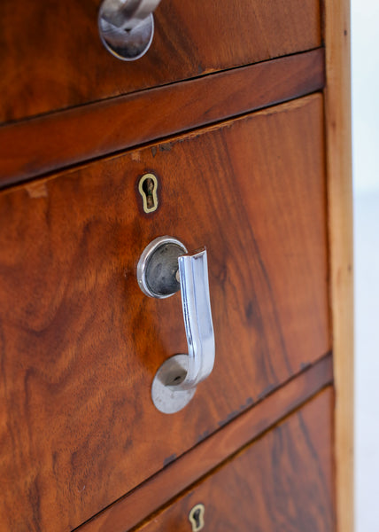 A Pair of Late Art Deco Bedside Cabinets