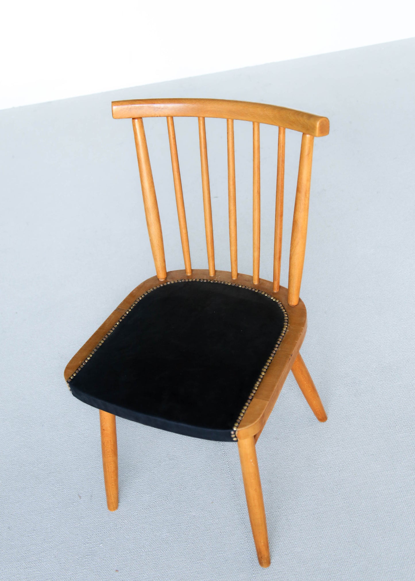 Four Spindle Back Mid-century Dining Chairs