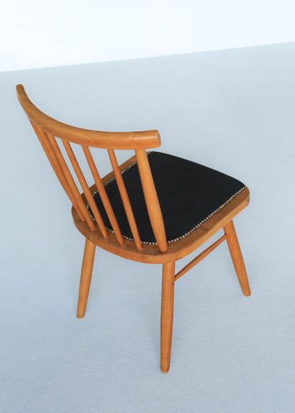 Four Spindle Back Mid-century Dining Chairs