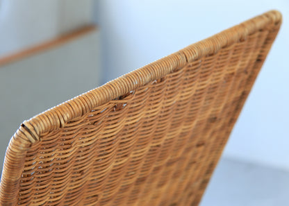 A Pair of Rattan Patio Chairs