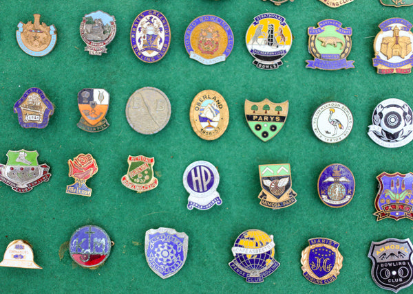 Display Cabinet with Vintage Enamel Bowling Badges