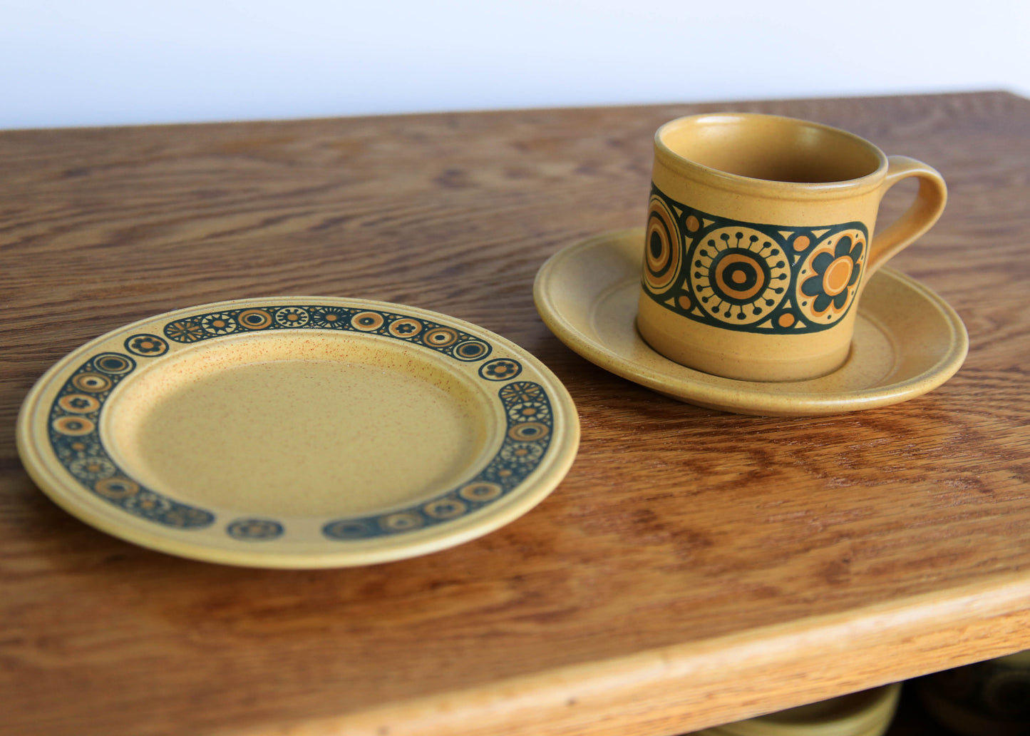 Six Bacchus Coffee Trios from Kiln Craft, England