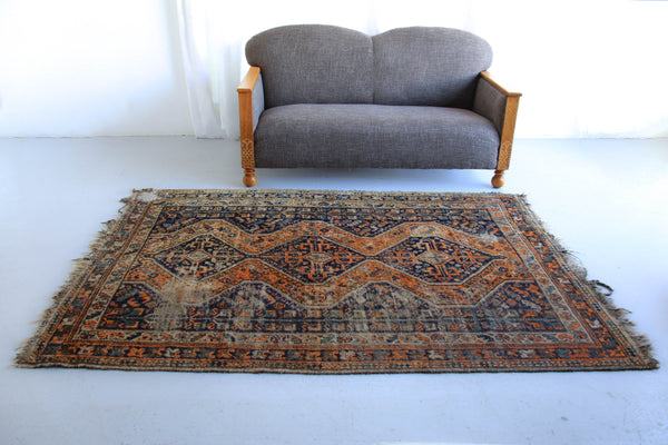 A Worn Vintage Rug