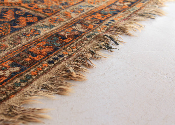 A Worn Vintage Rug