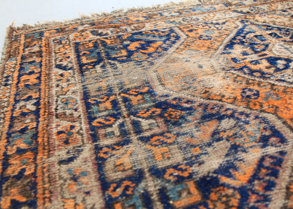 A Worn Vintage Rug