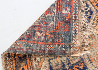 A Worn Vintage Rug