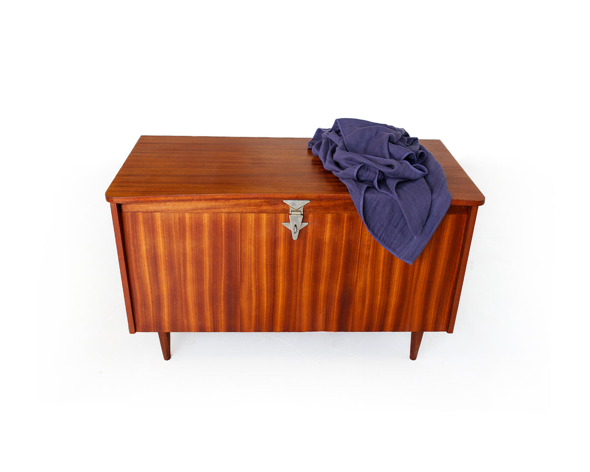 Mid-Century Kist with Tapered Legs and Shaped Top