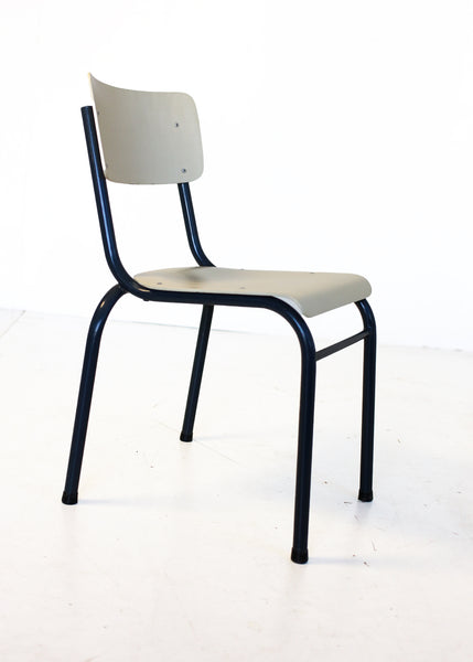 Four Cream and Black Chappie Chairs