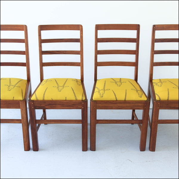 Four Ladder Back Dining Chairs