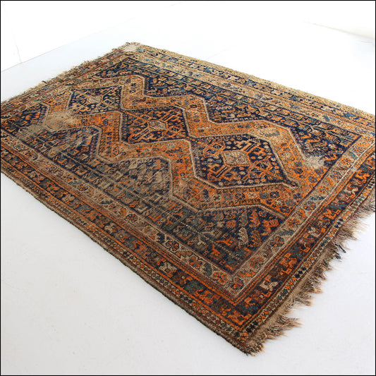 A Worn Vintage Rug