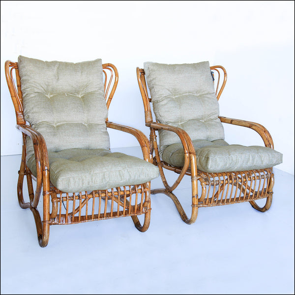 A Pair of Wingback Cane Armchairs