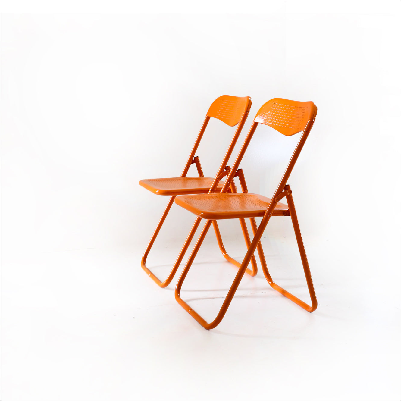 A Pair of Vintage Metal Folding Chairs