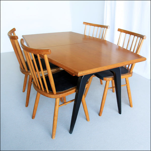 Four Lubke Dining Chairs