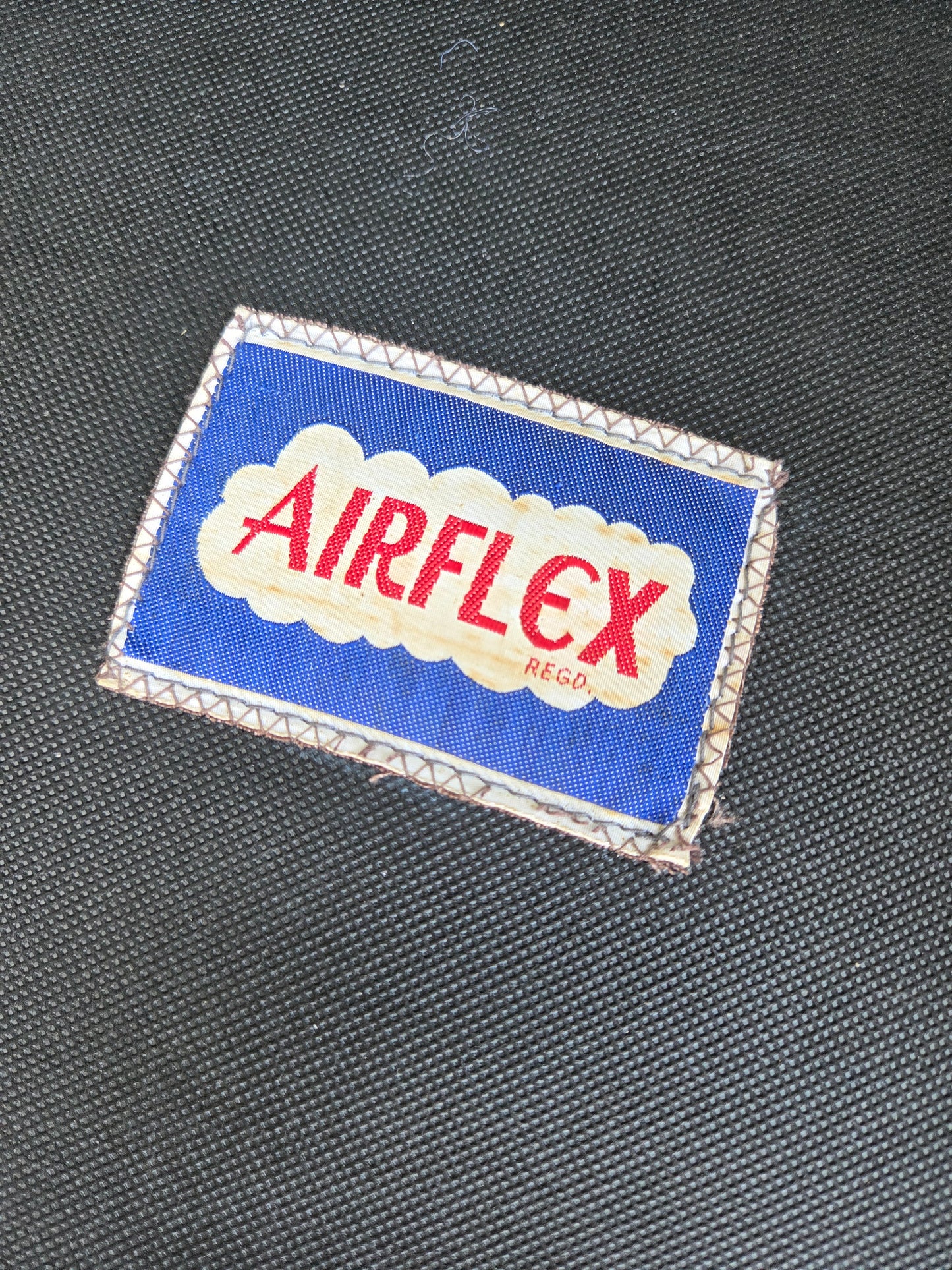 Pair of Airflex Armchairs and Three-seater Sofa - priced per item