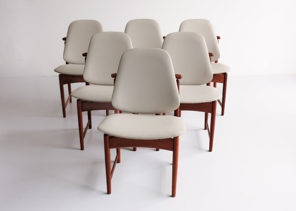A Set of Six Frystark Status Dining Chairs