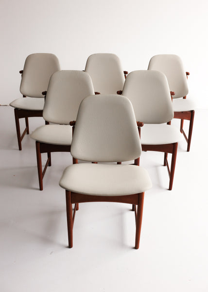 A Set of Six Frystark Status Dining Chairs