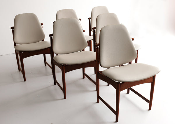 A Set of Six Frystark Status Dining Chairs