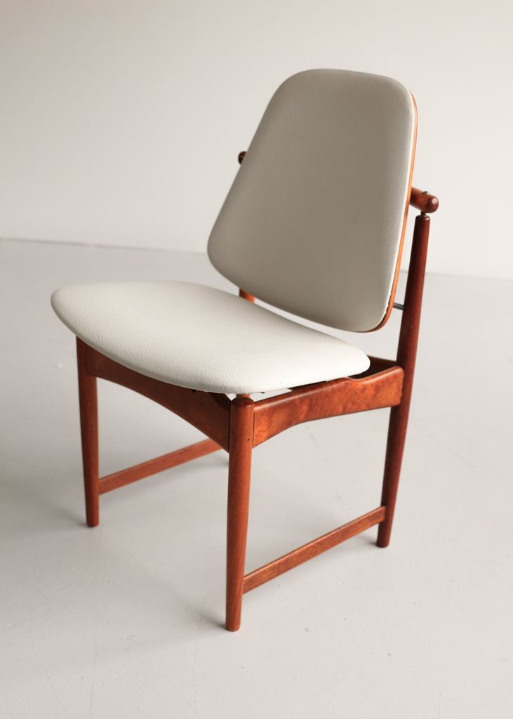 A Set of Six Frystark Status Dining Chairs