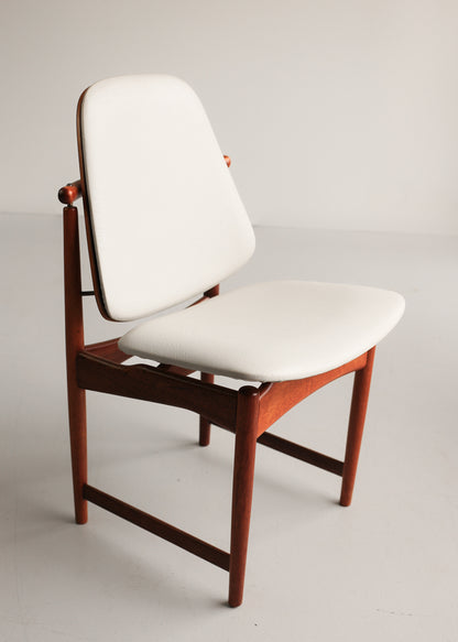 A Set of Six Frystark Status Dining Chairs