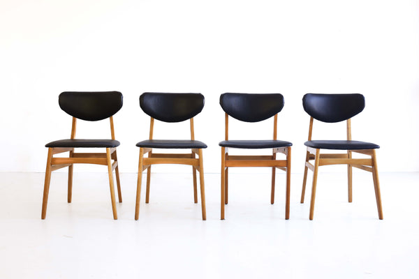A Set of Four Dining Chairs
