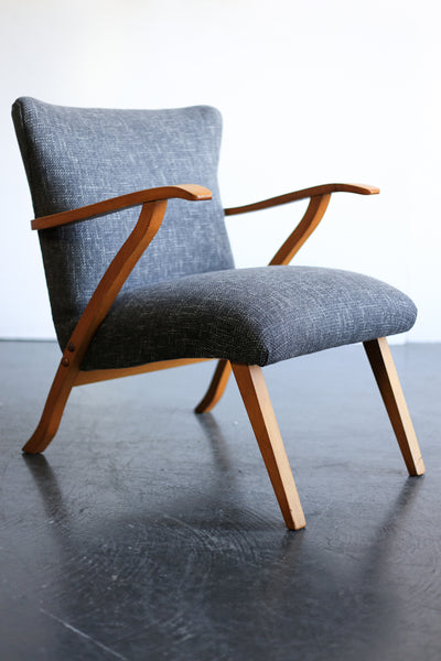 A Pair of Elegant Mid-Century Chairs