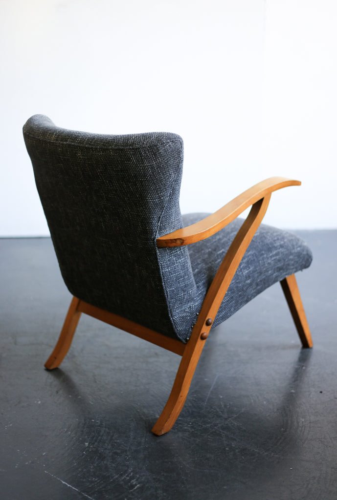A Pair of Elegant Mid-Century Chairs