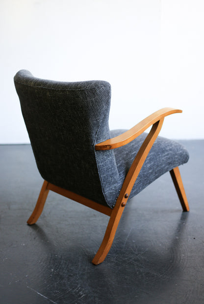 A Pair of Elegant Mid-Century Chairs