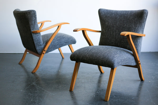 A Pair of Elegant Mid-Century Chairs