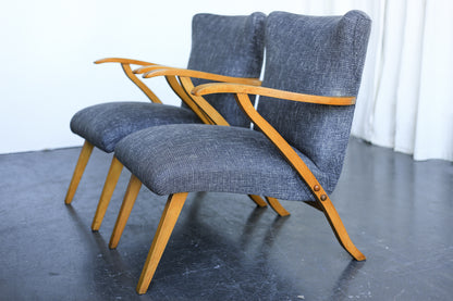 A Pair of Elegant Mid-Century Chairs
